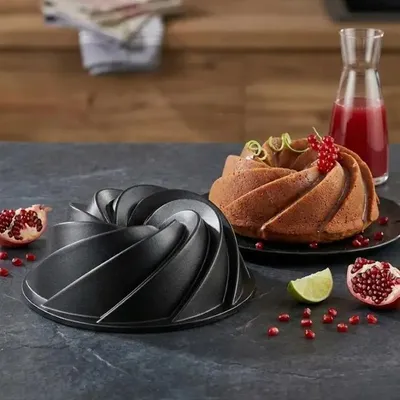 Produktbild von Wind Rose Kuchenform schwarz 26 cm, gleichmäßiges Backen