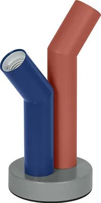 A table lamp with two angled tubes, one blue and one red, on a gray circular base.