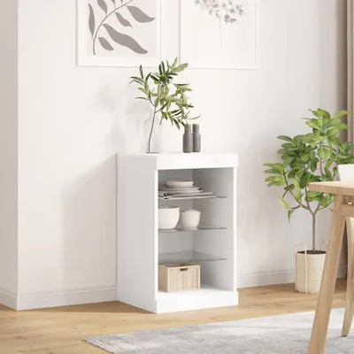 A white sideboard with glass shelves in a room.