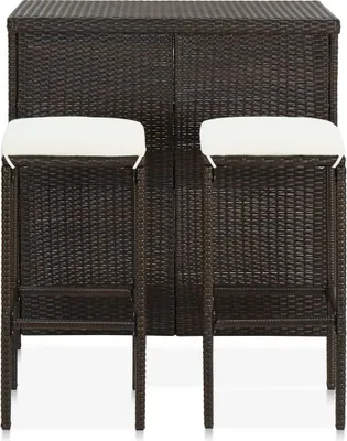 A bar set with two stools in front of a bar cabinet.