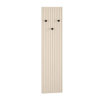 A close-up studio shot of a beige wall-mounted coat rack with three black hooks.