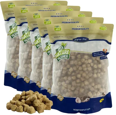 A group of five bags of pet food, with some food spilled in front.