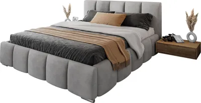 A modern upholstered bed with a headboard and bedding, placed on a white background with a bedside table to the right.