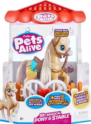 The image shows the retail packaging of a toy pony and stable set. The packaging is designed to resemble a stable with a red roof. The toy pony is visible inside the clear plastic packaging, along with accessories like a saddle and bridle. Text on the pack