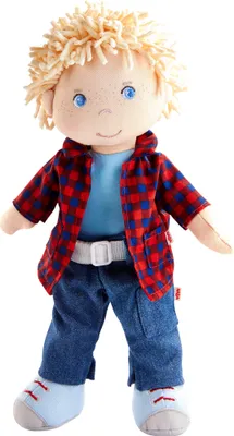 A full-body shot of a plush doll.