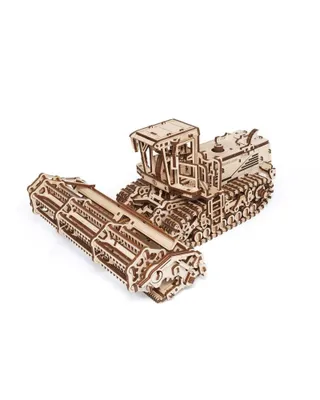 A wooden model of a self-propelled mower.