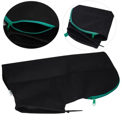 A black leaf bag with a green zipper, shown from multiple angles.