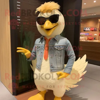 Productafbeelding van Tan Chicken mascotte REDBROKOLY kostuum karakter gekleed met een Flare Jeans en zonnebril