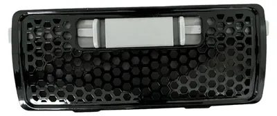 A close-up, isolated shot of a black filter grille with a honeycomb pattern.