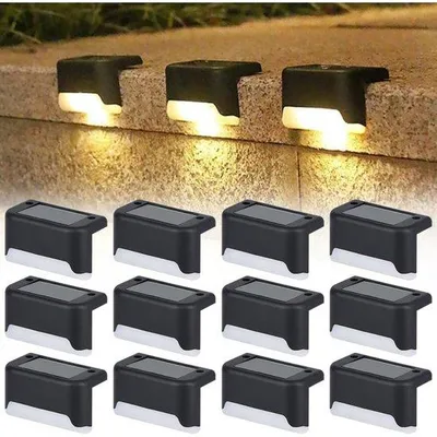 Immagine prodotto di Set di lampade solari da esterno - Lampade solari decorative impermeabili - Adatte per terrazze, giardini, scale e gradini - Confezione da 12 - Luce bianca calda