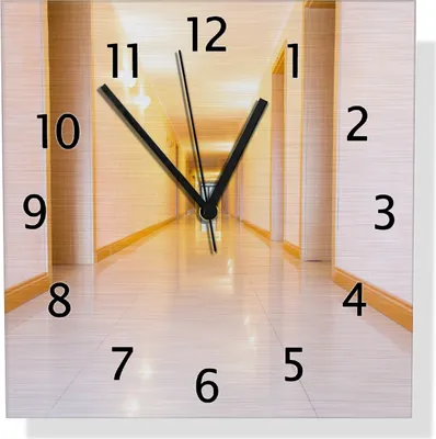 Produktbild von Wallario Design Wanduhr Strahlend sauberer Flur mit goldenem Licht und weißen Wänden aus Aluverbund, Größe 30 x 30 cm