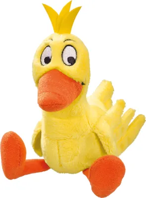 A plush toy duck sitting down.