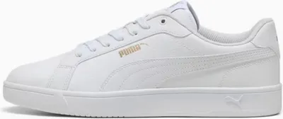 A side view of a white Puma sneaker against a white background.
