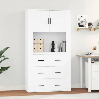 A white highboard with drawers and cabinets, placed in a room with a desk and shelves on the side.
