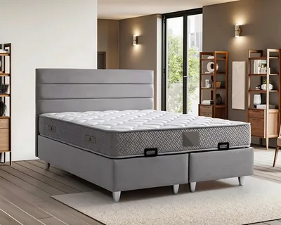 Produktbild von Elegantes graues Bett mit Matratze aus Textil und Holz
