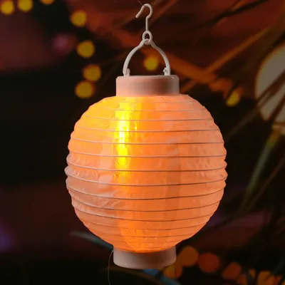 Produktbild von LED Solar Lampion - Flammeneffekt - 12 warmweiße LED - H: 23cm - D: 20cm - Lichtsensor - weiß