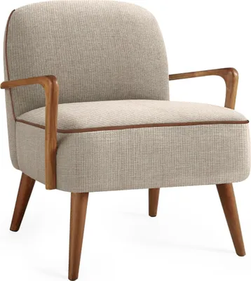 A studio shot of a single armchair against a white background.