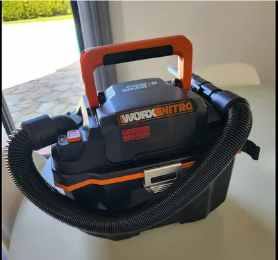 Produktbild von WORX Akku Nass-/Trockensauger - WX031.9 - mobil und handlich - 20V - mit Fugendüse und Breitstrahldüse - ohne Akku und Ladegerät, Schwarz/Orange