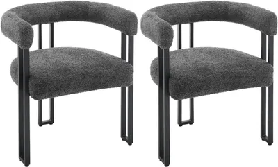 Two dark gray upholstered chairs with black metal frames are shown against a white background.