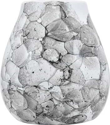 A close-up studio shot of a decorative glass vase with a bubble-like pattern.