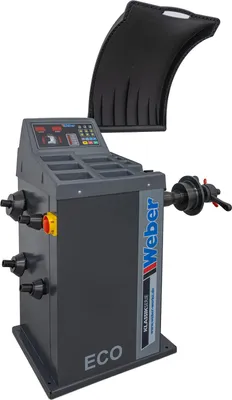 A professional studio shot of a car wheel balancing machine.