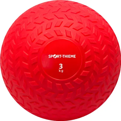 A red slamball with weight and brand information printed on it.