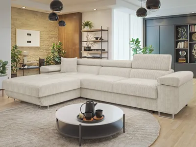 A modern living room with a large sectional sofa, coffee table, and shelving unit.