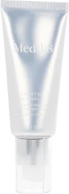 A silver and white tube of skincare product.