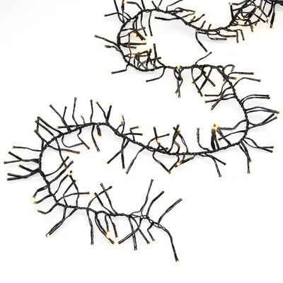 Produktbild von Konstsmide - Micro LED Büschelllichterkette "Cluster", mit 8 Funktionen, Steuergerät und Memoryfunktion, 576, warm weiße Dioden, 24V Außentrafo, schwarzes Kabel ; 3861-100
