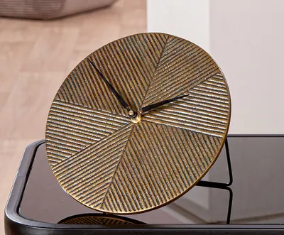 Immagine prodotto di Gilde Stand-/ Tischuhr, rund, "Rapa", Aluminium, bronzefarben, VE 3, L. 15.5 cm, D. 20.5 cm 53371 4063387533710