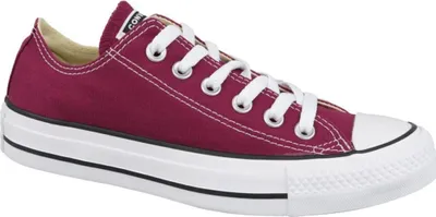 A single burgundy Converse Chuck Taylor All Star low-top sneaker with white laces and a white sole, shown from the side against a white background.