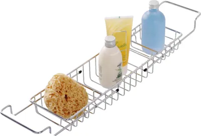 A metal bath caddy with various bath products on it.