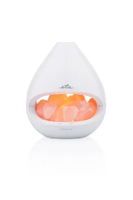 A white aroma diffuser with Himalayan salt rocks inside, displayed on a white background.