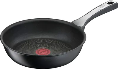 A black frying pan with a silver handle is shown against a white background.