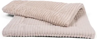 A folded pet blanket on a white background.