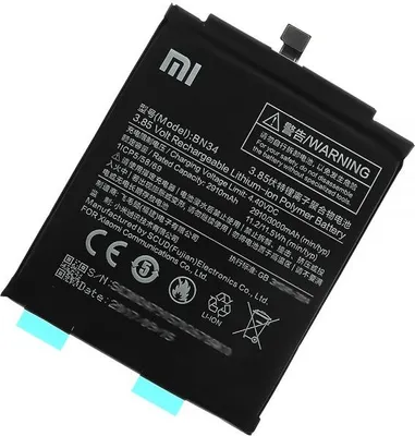 A black battery for a Xiaomi phone, with text and logos printed on it.