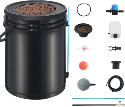 A hydroponics system kit laid out on a white background.