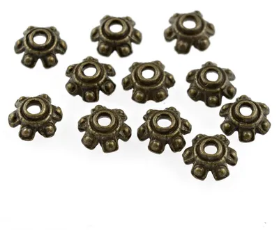 Produktbild von Vintageparts 20 Perlkappen Aztek antik bronzefarben 7 mm