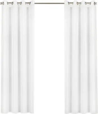Two white curtains hanging from a curtain rod.
