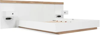 A modern white bed frame with integrated nightstands and a wooden headboard.