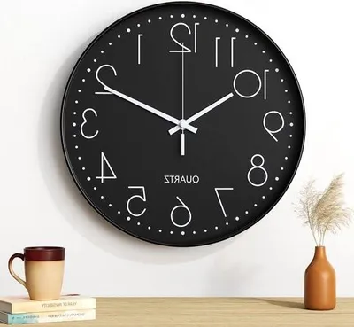 Image de Horloge murale moderne et silencieuse - 30 cm - signe noir et blanc