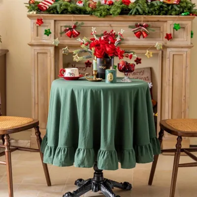 Immagine prodotto di Tovaglia in cotone e lino con bordo a frange, 130x180 cm, verde scuro, stile rustico