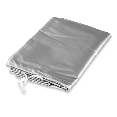 A folded silver tarp or cover with a drawstring.