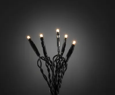 Produktbild von Konstsmide - Micro LED Lichterkette, 20 warm weiße Dioden, 24V Innentrafo, grünes Kabel ; 6351-120