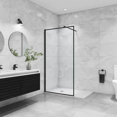 A modern bathroom with a walk-in shower, vanity, and toilet.