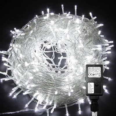 Immagine prodotto di Yakimz 10M 100 LED luci fiabesche bianco freddo 8 modalità di luce festa giardino interno esterno decorazione luci di Natale IP44