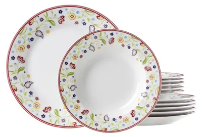 A set of dinnerware with a floral pattern.