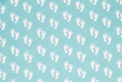 Produktbild von Geschenkpapier Baby Füße / Hände beidseitig 70cm x 2m Rolle hellblau