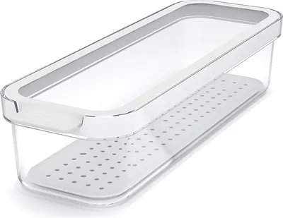 A clear, professional studio shot of a transparent food storage container with a white perforated insert and lid.