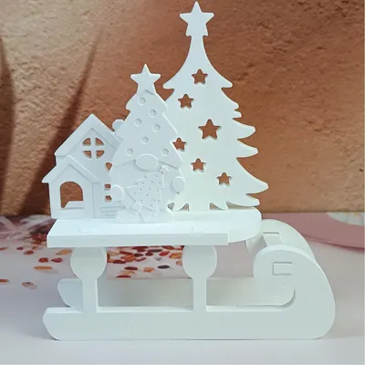 Immagine prodotto di Set di 7 stampi in silicone a tema natalizio: casa e albero di Natale, ideali per realizzare candele, oggetti in gesso e progetti di artigianato